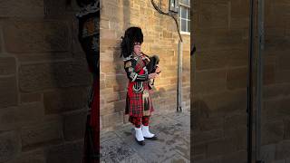 A bagpiper busking with the Great Highland bagpipe on the street in Edinburgh Scotland shorts [upl. by Andrus832]