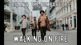 Текстперевод песни Rilan amp The Bombardiers  Walking On Fire [upl. by Ahteres487]