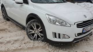 Test Peugeot 508 RXH Hybrid4 on snow [upl. by Htiekel98]