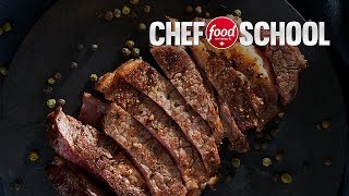 How to Cook the Perfect Ribeye Steak Without a Grill  Chef School [upl. by Aihsyak]