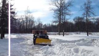 2002 Arctic Cat 300 4x4 plowing foot of snow [upl. by Ailliw]