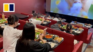 Moviegoers indulge in growing trend of ‘hotpot cinema’ [upl. by Danialah971]