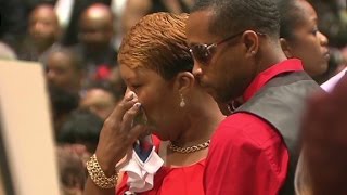 The family of Michael Brown walks into his funeral service [upl. by Gilletta537]