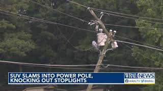 SUV slams into power pole knocking out stoplights [upl. by Etirugram173]