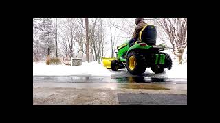 John Deere X590 plowing 5 to 6 inches of snow [upl. by Derick671]