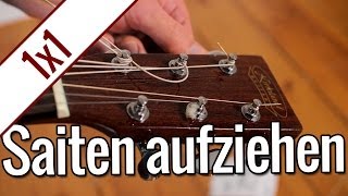 Gitarrensaiten aufziehen  Gitarren 1x1 [upl. by Analaf820]