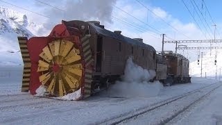 Snow Plowingtrainfart originalDampfschneeschleuder Xrot d 9213 und Bernina Krokodil  Zug train [upl. by Aipotu]