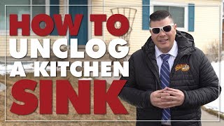 How to Unclog a Kitchen Sink with a Plunger [upl. by Laup]