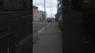 Translink glider 2 bus passing odyssey bus stop to the city centre 15918 [upl. by Sakiv285]