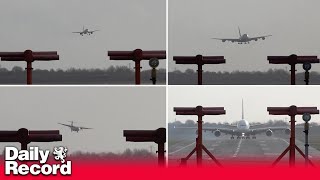 Storm Isha Planes battle to land at Birmingham Airport in strong winds [upl. by Anyzratak]