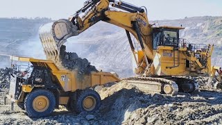 Caterpillar 6030B excavator loading and cat 777 truck lifting power [upl. by Aryajay]