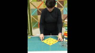 Easy Quilt from a Layer Cake from quiltfabriccom called Chris Cross [upl. by Rednasxela]