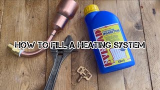 How to fill a heating system bleed and vent a radiator [upl. by Norling]