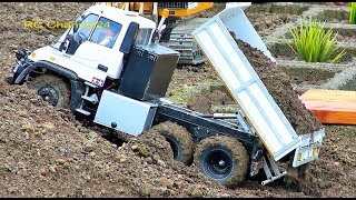 RC Mercedes Unimog and Construction machinery in action Big Roadworker parcours fun [upl. by Llenrac]