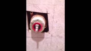 How to cut a shower valve hole in tile [upl. by Loginov]