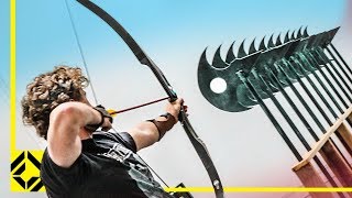 Can You Fire an Arrow through 12 Axes Odysseus Archery Challenge [upl. by Abell]