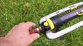 Melnor XT TwinTouch Metal Base Oscillating Sprinkler review [upl. by Dotty]