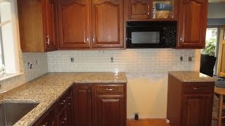 How to install a Glass tile kitchen backsplash Part 2 [upl. by Anaher380]