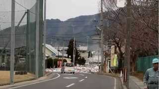 2011 Japan Tsunami the water pouring over the seawall in Miyako Stabilized [upl. by Htenywg]