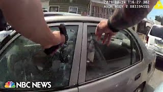 Philadelphia officer charged with murder after bodycam video shows him firing into car [upl. by Rosenquist]