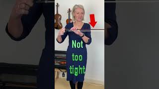 How to tighten a violin bow shorts [upl. by Coppins]