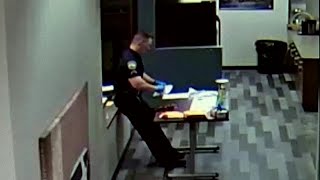 WATCH Officer collapses while packing up drug evidence laced with fentanyl [upl. by Rednaskela260]