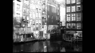 1920 Schilderachtig Oud Amsterdam met oa Oudezijds Achterburgwal en Zeedijk  oude filmbeelden [upl. by Ayihsa57]