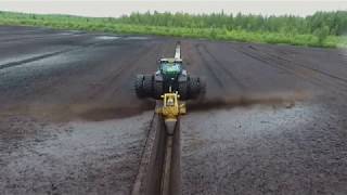 Bog clearing Meripeat OJK13 screw type ditcher in ditch opening [upl. by Fasta]