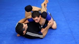 How to Do the Triangle Choke  MMA Fighting [upl. by Anilah170]