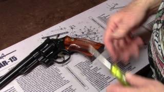 How to Disassemble and Care for a SampW Revolver  Learn from a Factory Trained Armorer [upl. by Zzahc855]