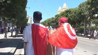 Supporters of Tunisias president demonstrate in support of his candidacy [upl. by Ynomrah]