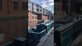 Narrowboats crossing on the Worcester and Birmingham canal at The Mailbox looking south narrownboat [upl. by Adekam]