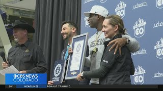 Colorados Coach Prime sets Guinness World Record for largest American football lesson [upl. by Aisinut]