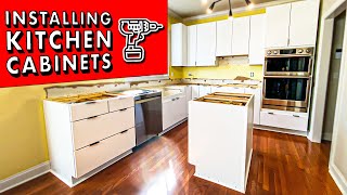 How to INSTALL KITCHEN CABINETS and remove them  DIY Kitchen Remodel Pt 1 [upl. by Jasik]