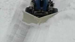 VPlow Snow Removal Attachment  Grasshopper Mowers [upl. by Ahsenahs]