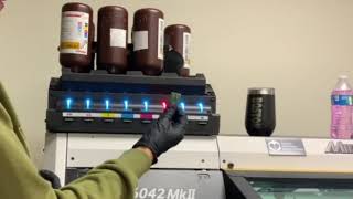 How to TUTORIAL change ink on a Mimaki UV printer changeink mimaki6042 lh100 uvprint [upl. by Iveson]