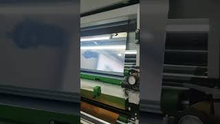 Silver PET film lamination in Drupa HZKDX laminating laminator Italian hot knife plastificatrice [upl. by Ppik]