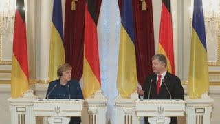 Merkel condena elecciones en repúblicas separatistas en visita a Kiev [upl. by Iznyl]