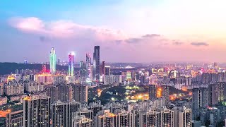 A birds eye view of Nanning GuangxiChinaAerial views of Nanning skyline daynight [upl. by Nevad]