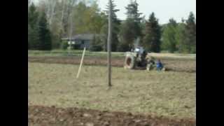 Field plowing with a John Deere 3 bottom trailer plow [upl. by Araf]