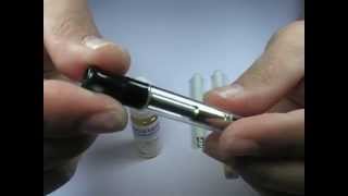 Comment remplir un clearomiseur Vega de cigarette électronique KR808 [upl. by Yeffej]