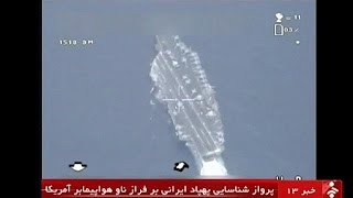 Iranian drone takes quotprecisequot photos as it flies over US aircraft carrier [upl. by Ahtibat974]