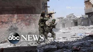 Syrian forces battle ISIS for the city of Raqqa [upl. by Obelia]