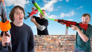 Our Dad Tried to Sneak Attack Us Family Nerf Battle [upl. by Adroj814]