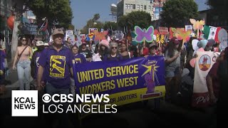 May Day marchers in Hollywood call for protection of workers and immigrant rights [upl. by Boatwright635]