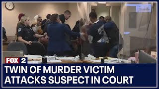 Twin of murder victim attacks suspect in court after seeing evidence video [upl. by Azal]