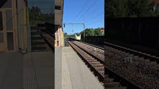 Helenelund station with passing Arlanda express train [upl. by Adaline]