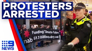 Climate protesters arrested after targeting Queensland NAB  9 News Australia [upl. by Blanch]