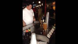 Pouring beer while taking money with the bottoms up draft system [upl. by Jehias149]