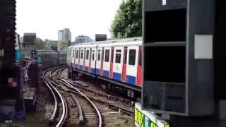 District Line D78 stock trains at Putney Bridge [upl. by Sirrah]